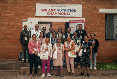 A group of Operation Smile nutrition educators gather