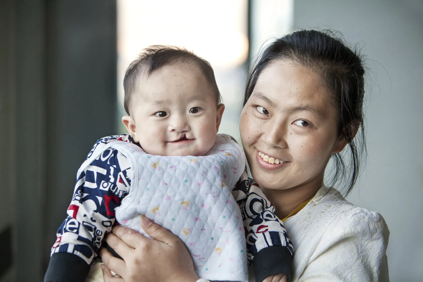 Seven-month-old Yi Miang and his mom, Lu Gong'e, during Operation Smile China's 2016 surgical program to Lincang.