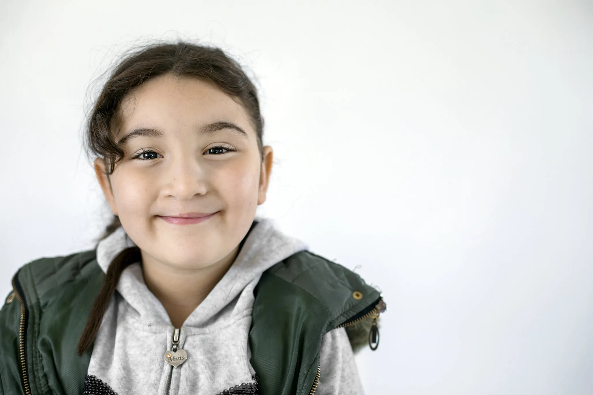 Rania smiles after receiving surgery in Morocco.
