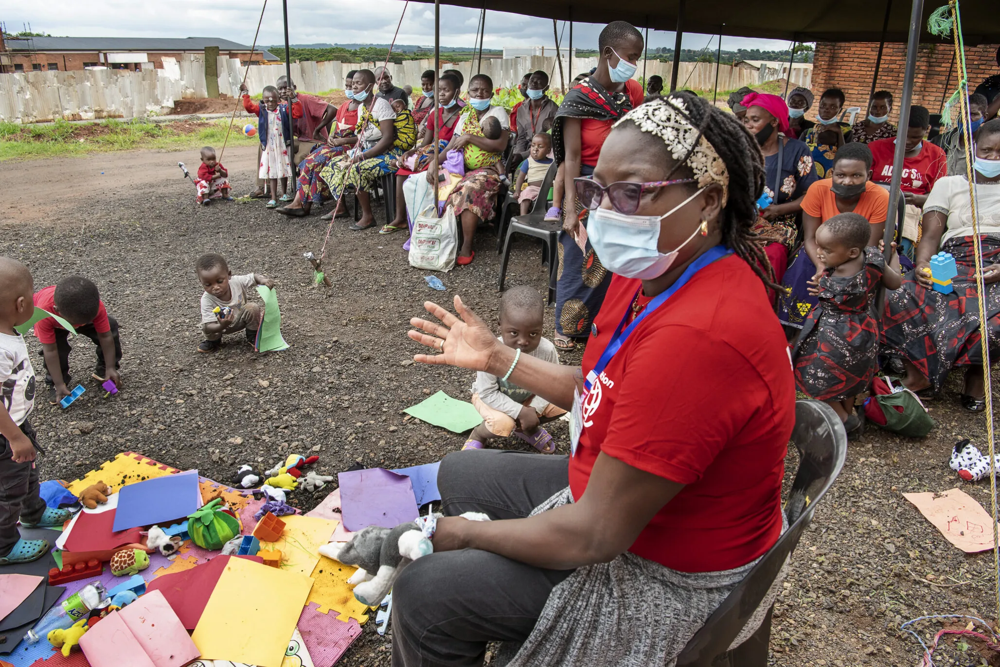 Cathy Cheonga interacts with patients and families at the child life station during a 2022 Operation Smile Malawi surgical program.