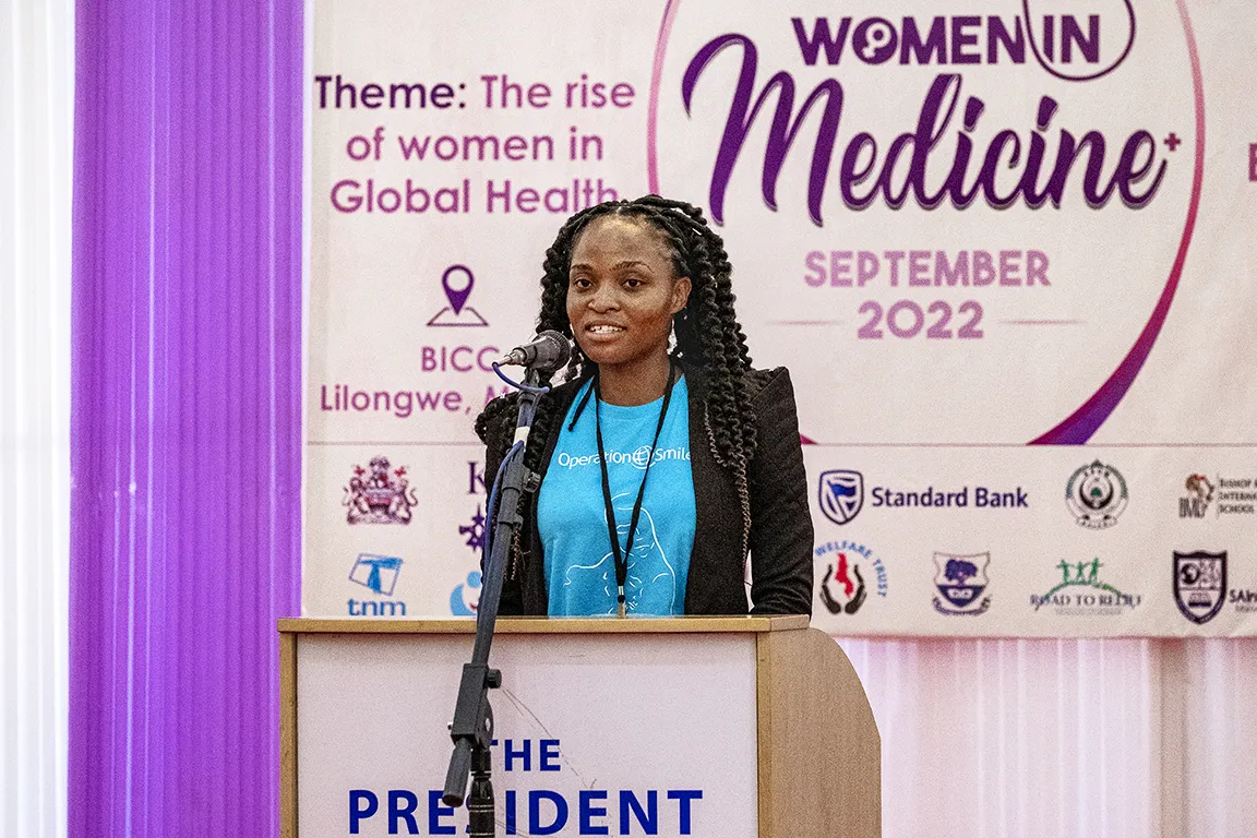 During Operation Smile Malawi's Women in Medicine surgical program in Lilongwe, guest speaker Carol Chigona shares her story of being born with a cleft condition and receiving care from the organization.