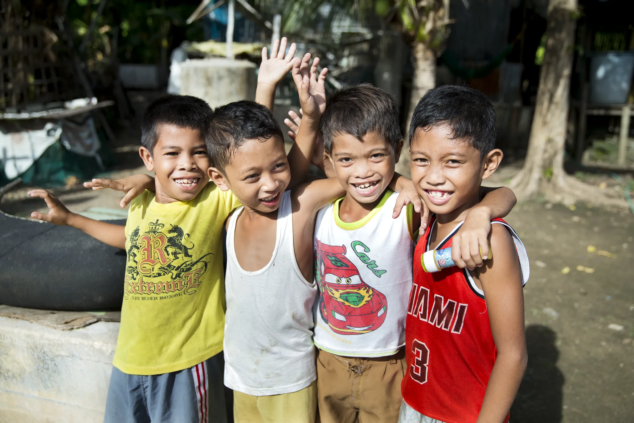 After his surgery, Efren smiles for the camera with friends.