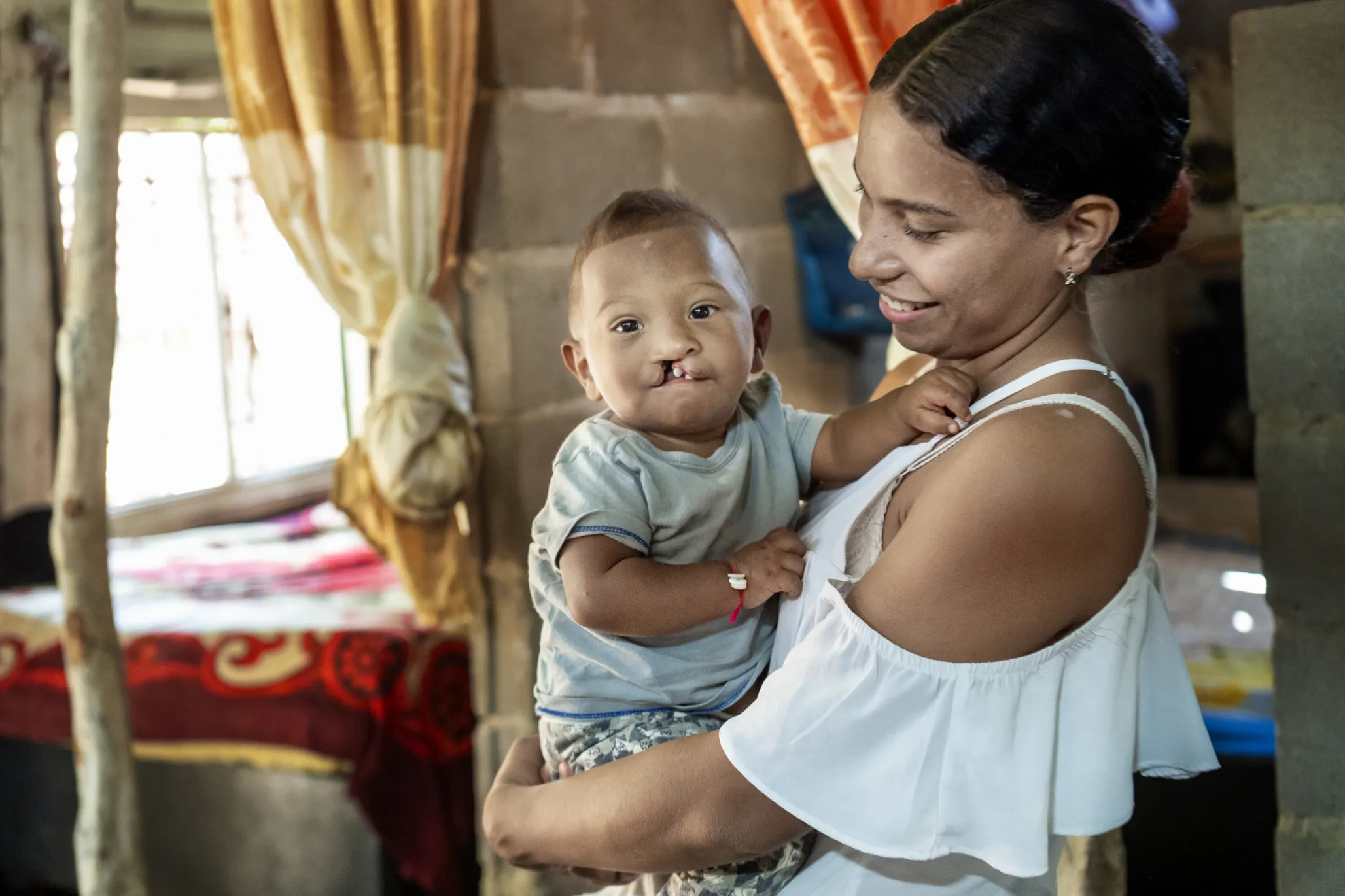 Ihan and his mother, Carla, pose for a quick photo.