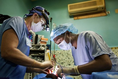 Plastic Surgeon Petra Peterson from Sweden with Plastic Surgeon - Observer's Romain Raherison from Madagascar on the first day of surgery.
