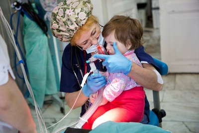 Dr Valentina Ostanina (left) administers anesthetic to Patient