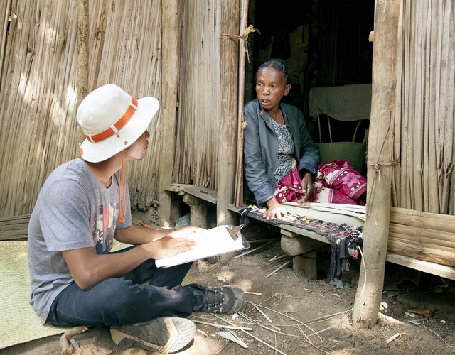 Madagascar volunteers conducting the 'Barriers to Care' study in a village.