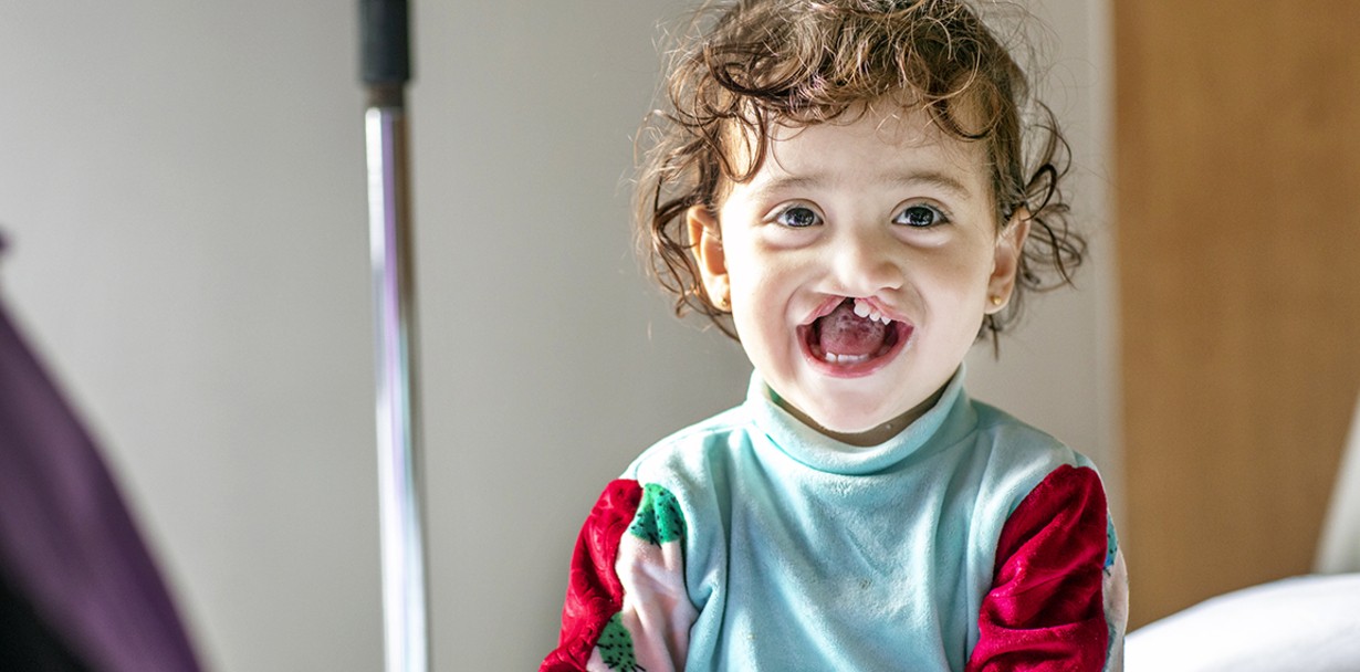 Janat shares her biggest smile while waiting during screening at Operation Smile Morocco’s October 2021 surgical program in Casablanca. Photo: Jasmin Shah.