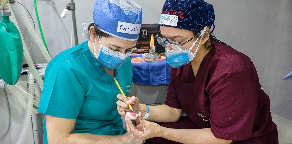 During the first Champion Program in Escuintla, Guatemala, volunteer dentist Dr. Monica De Leon of Guatemala, right, mentors dentist Dr. Eugenia Azmitia of Guatemala about the specifics of creating obturators for patients with cleft palate. 