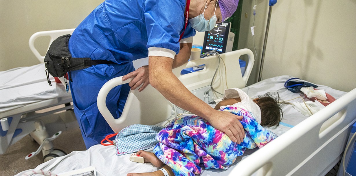 Volunteer post-anesthesia care unit nurse Carola Noren of Sweden checks on a patient following their cleft surgery during Operation Smile’s 2022 women-led surgical program in the Philippines.