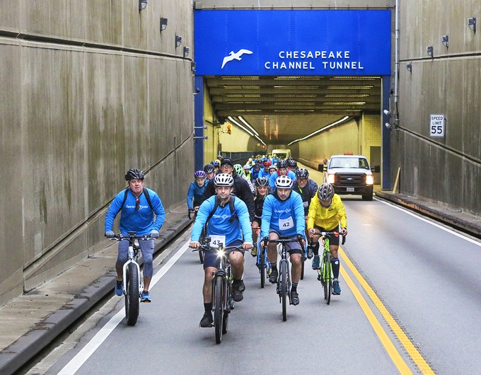 Cyclists of Cycle for Smiles ride across the Chesapeake Bay Bridge-Tunnel. 