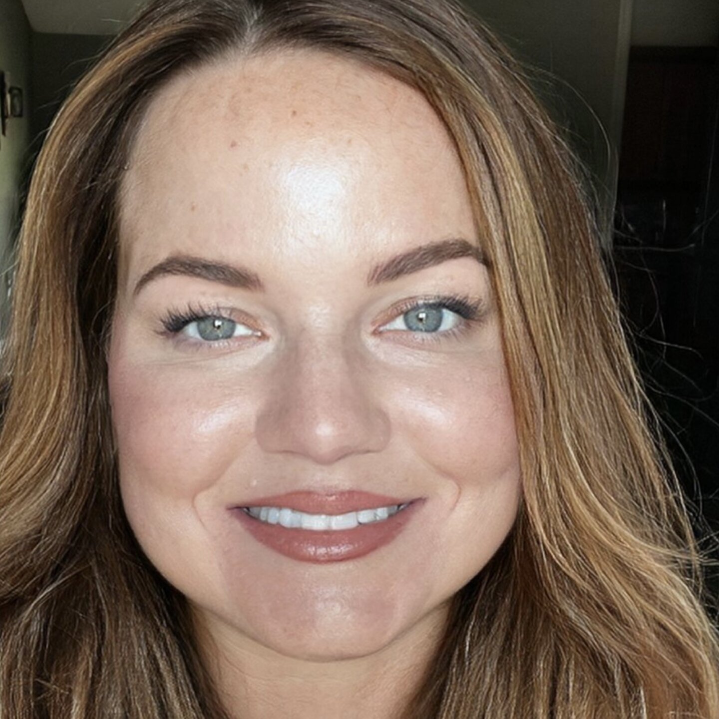 Angela Collie smiles for the camera.