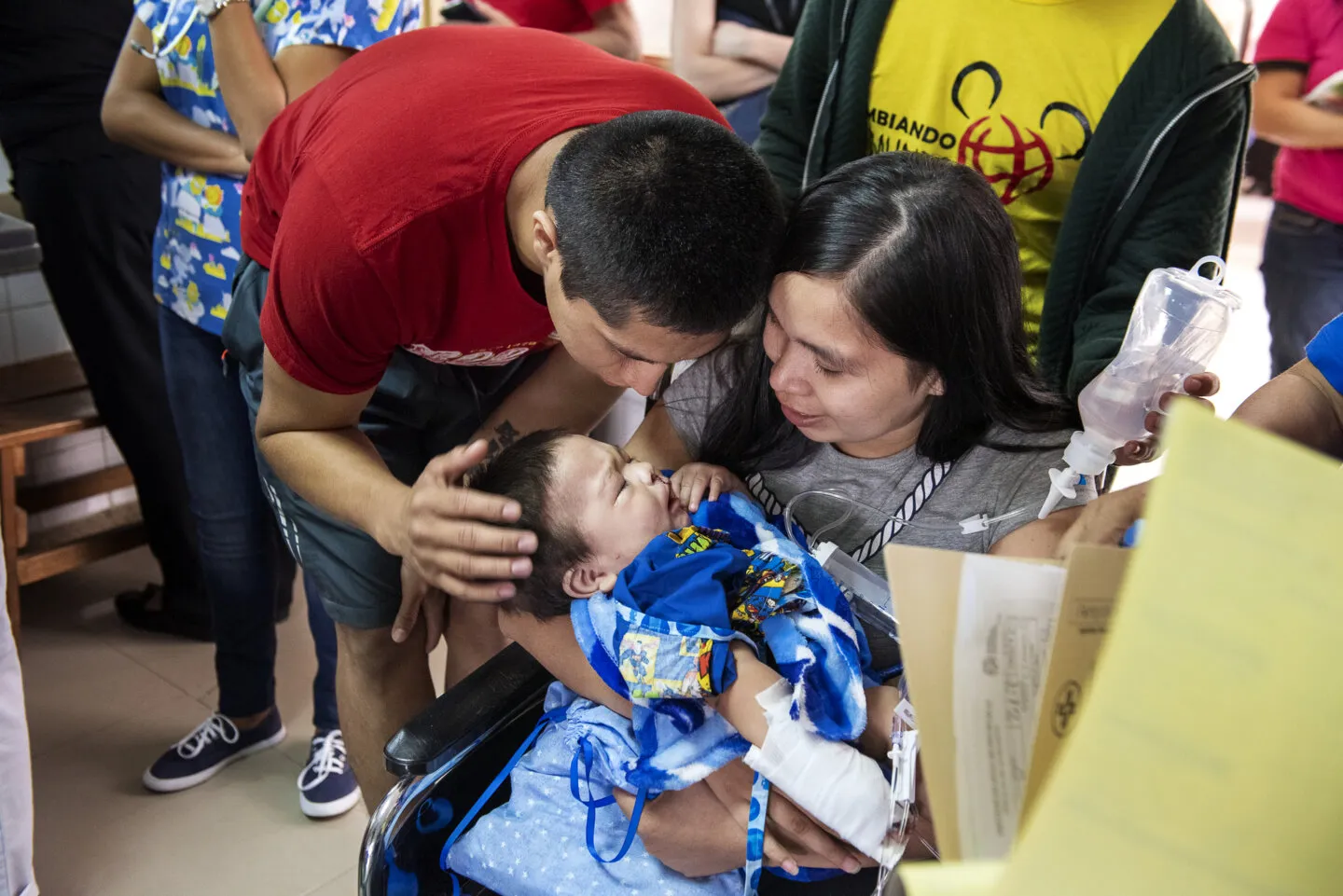 America and Felipe with their son Jack, after surgery.