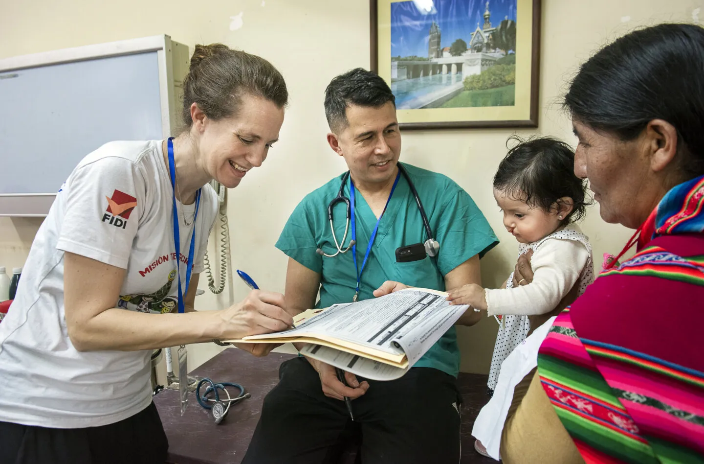 Volunteer pediatric anesthesiologist Dr. Karin Strand of Sweden and volunteer post-anesthesia care unit physician Dr. Ben Hu of the U.S. provide Heydi's comprehensive health evaluation to determine if she's healthy enough to receive cleft surgery during a 2018 surgical program in Santa Cruz.