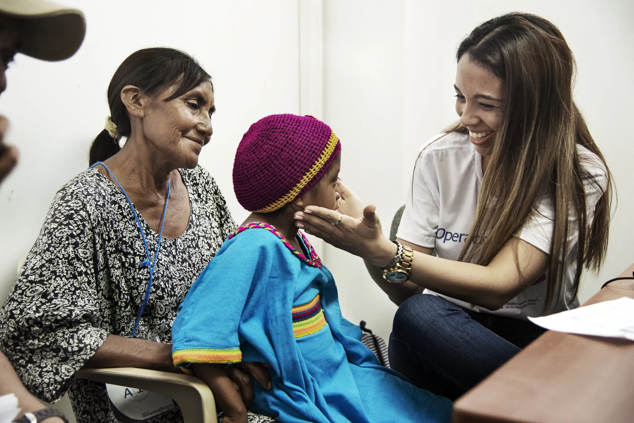Lexxi receives a speech therapy consultation from Operation Smile Colombia volunteer Paola Andrea Eussen as part of her comprehensive health evaluation during the August 2018 surgical program in Riohacha, Colombia.