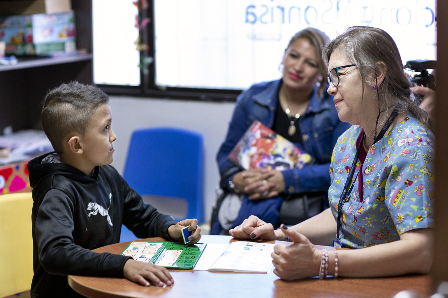 Operation Smile Colombia volunteer psychologist Nubia Bercerra works with a young patient at the Operation Smile Colombia care center in Bogotá, Colombia.
