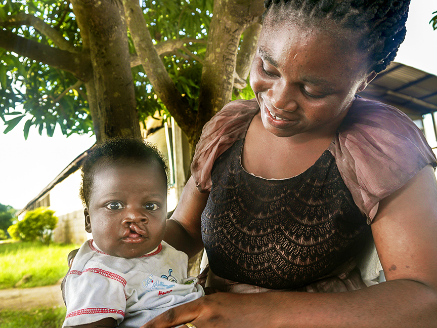 Kelvin with his adoptive mother, Felicia.