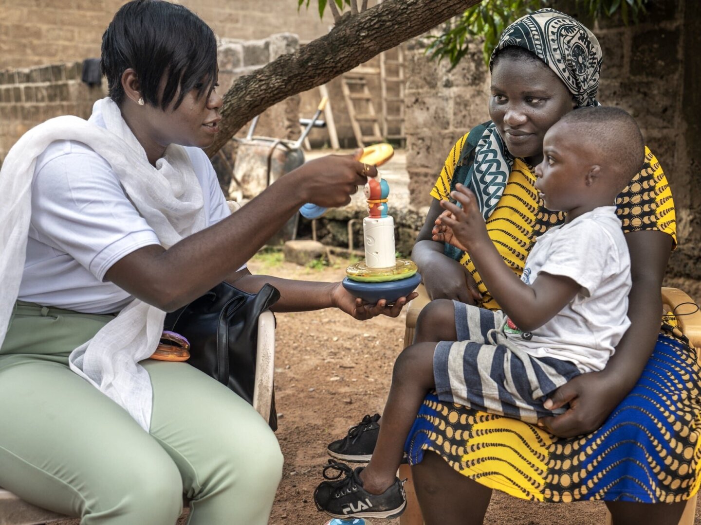 Malaika Addai-Sundiata, speech therapist, during a home-visit to five-year-old Newton and mother, Priscilla Buamah.