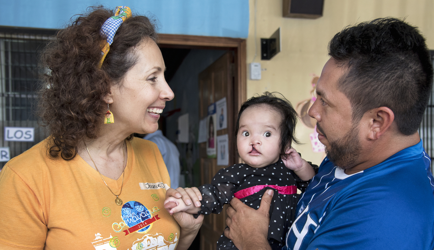 Operation Smile Honduras Executive Director Jeanie Barjum with 7-month-old Erika.