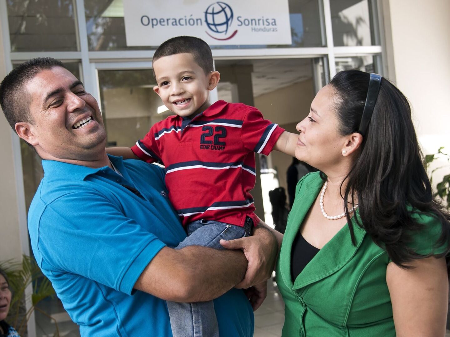Alex Guerrero smiles with his family.