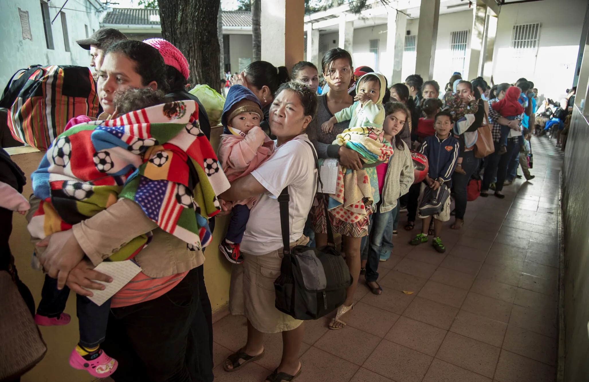 Patients and families wait to be seen during a surgical program in Honduras.