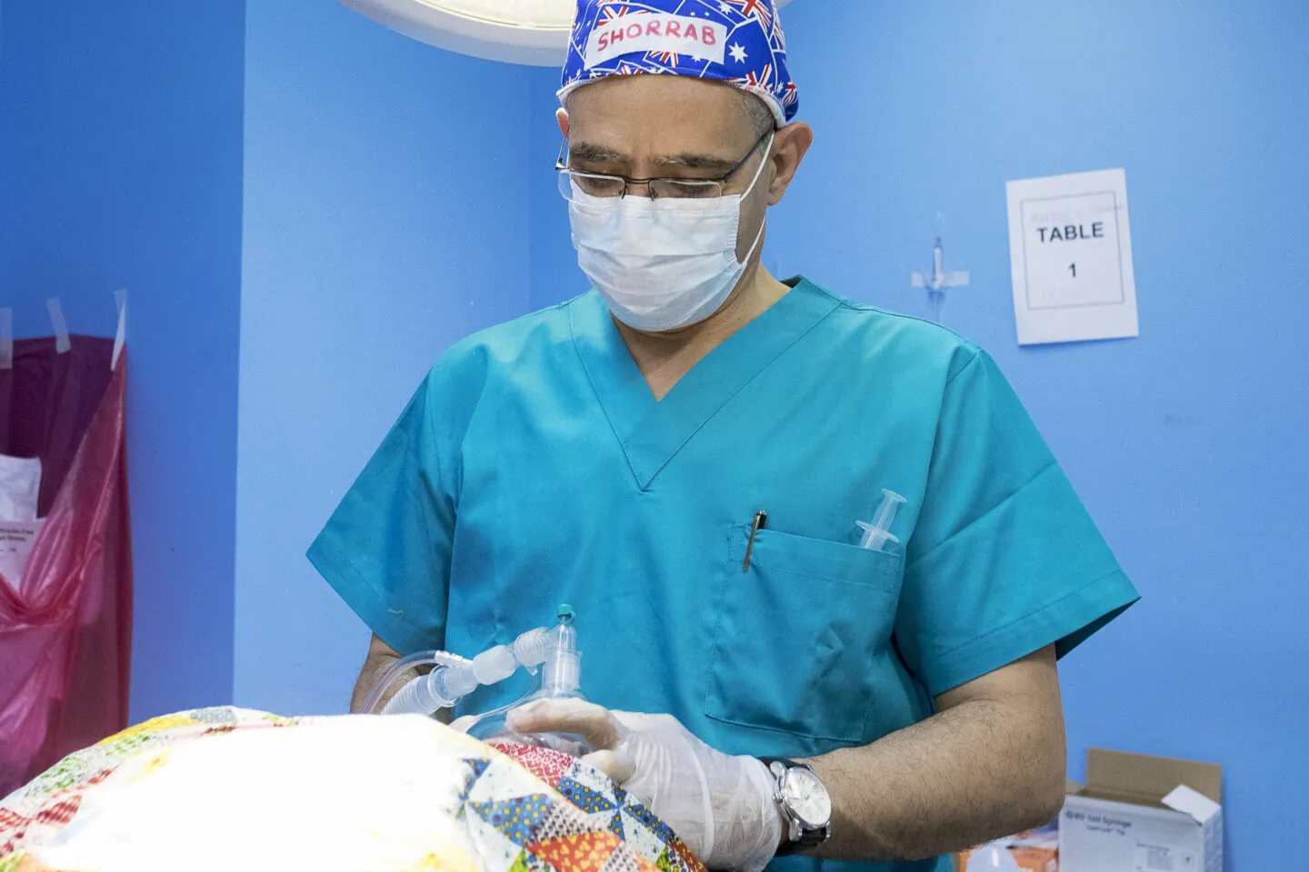 Anesthesiologist Ahmed Shorrab treats a patient during a surgical program in 2017 in Jordan.