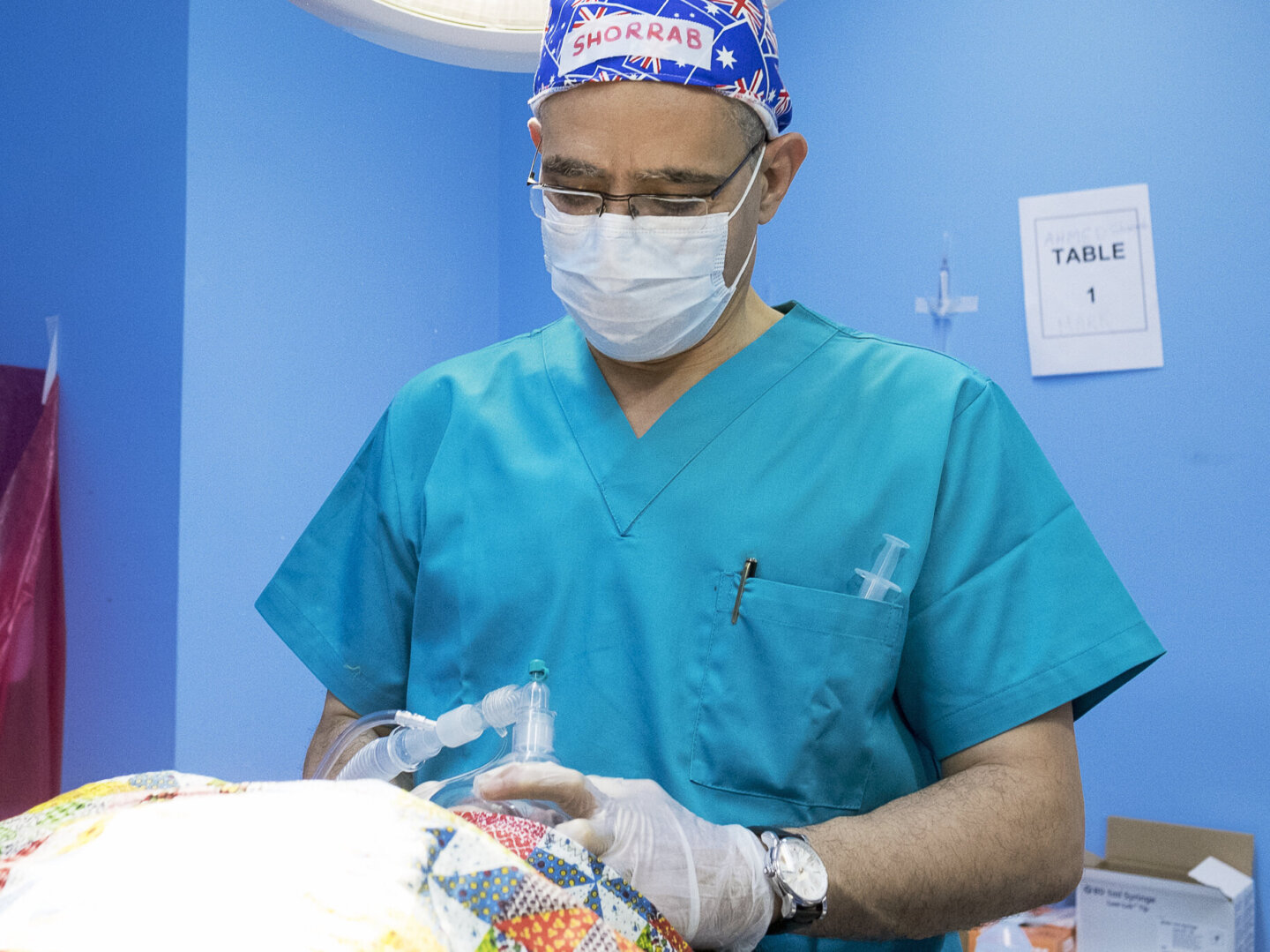 Anesthesiologist Ahmed Shorrab treats a patient during a surgical program in 2017 in Jordan.