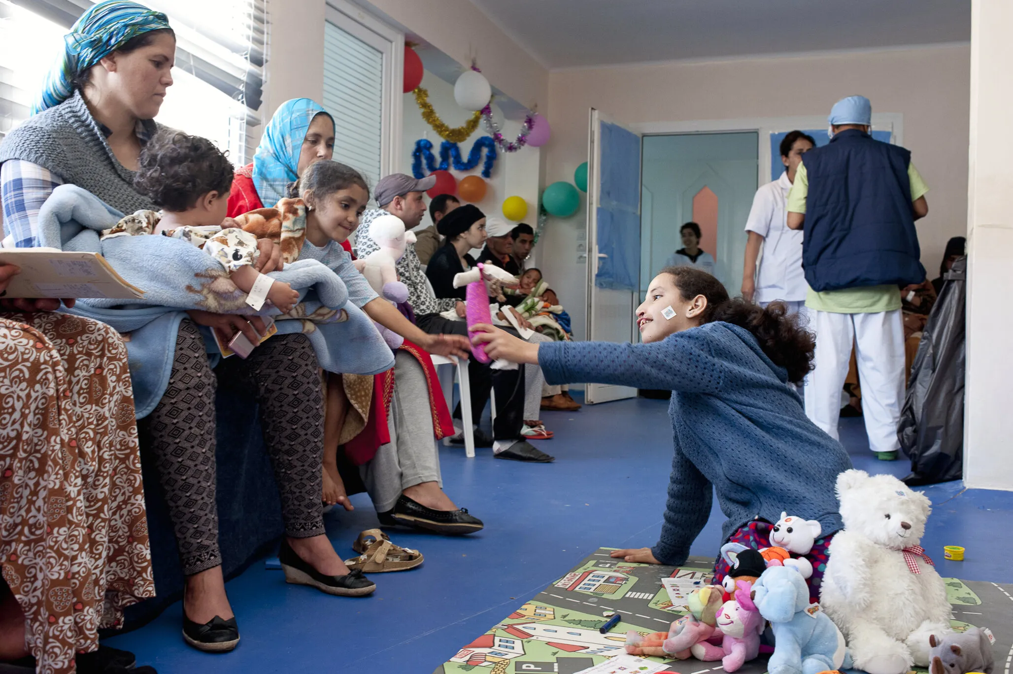 Twelve-year-old Siham plays with children also born with cleft conditions during Operation Smile Morocco's 2015 surgical program in Dakhla.