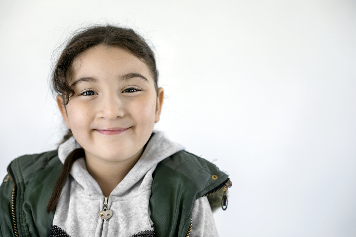 Rania smiles after receiving surgery in Morocco.