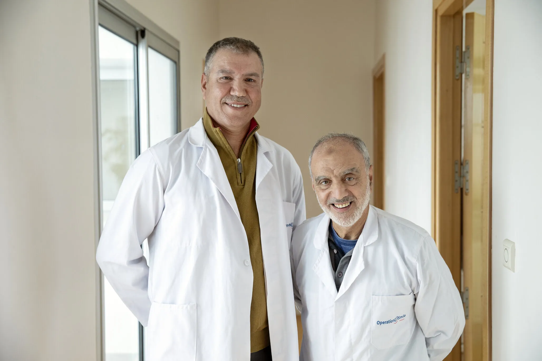 Volunteer surgeons Drs. Handouf Abdellah, left, and Kharbouch Abdelhouahab, right.
