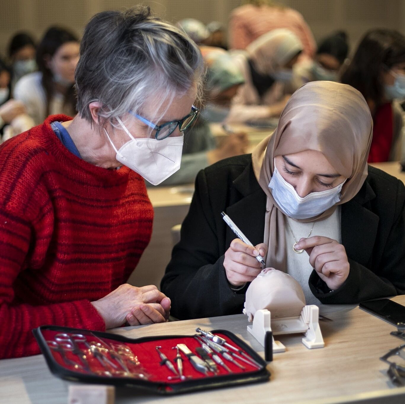 Surgeons discuss cleft repair techniques during the 2020 Women in Medicine surgical program in Morocco.