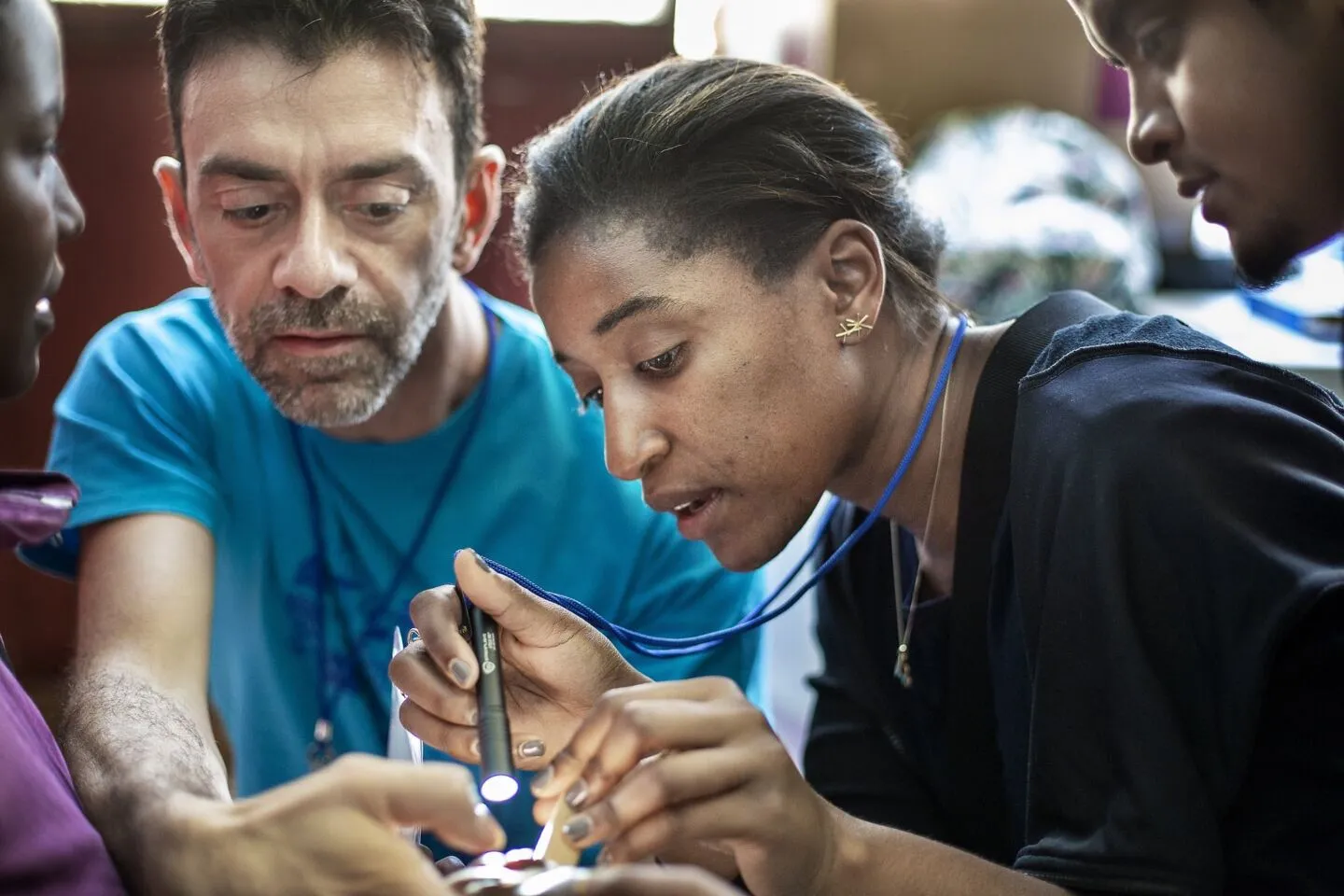 Surgeon Naikhoba Munabi discusses cleft surgery techniques during a program in Antsirabe, Madagascar.