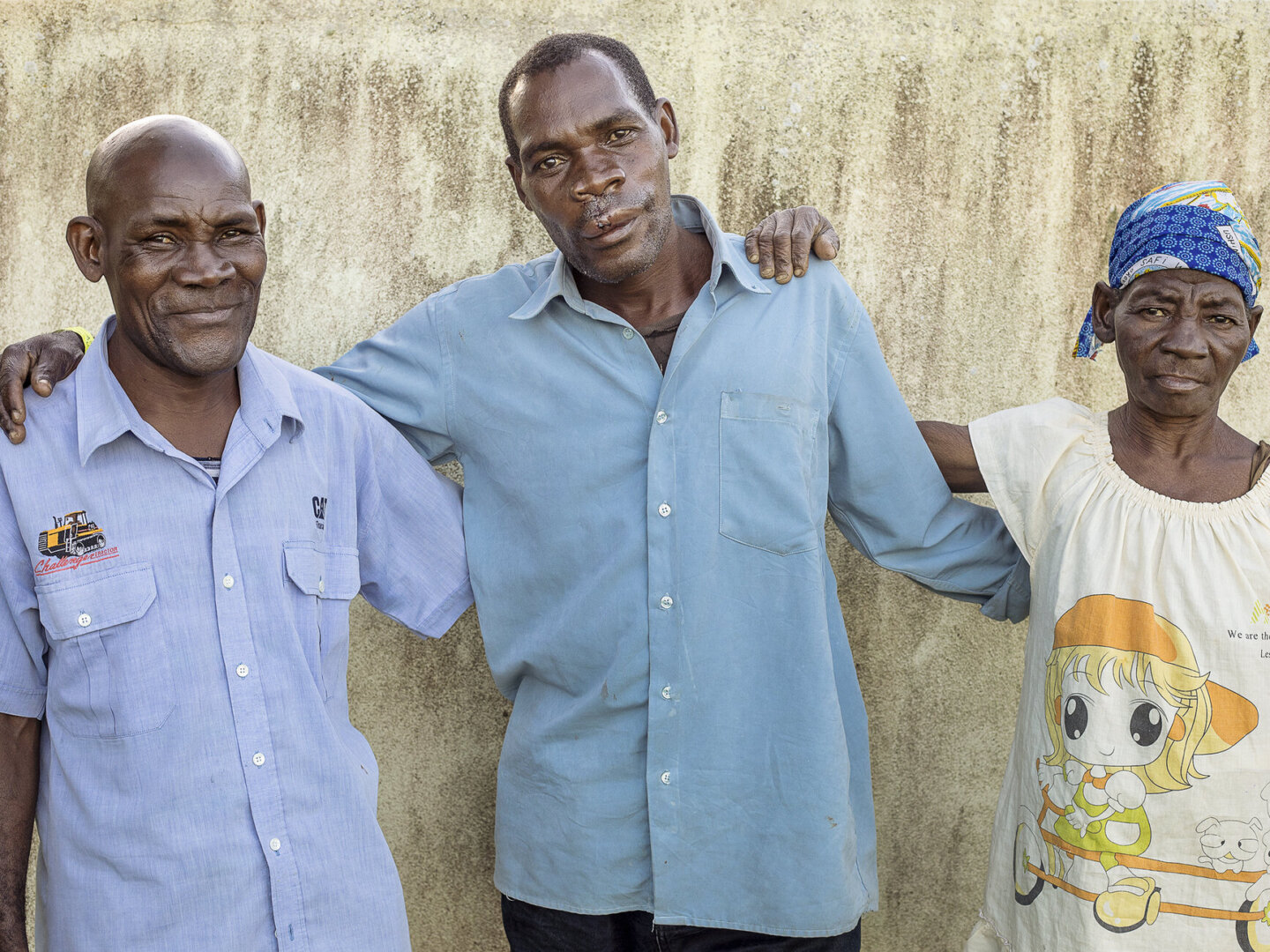 Domingos poses with his family after surgery.