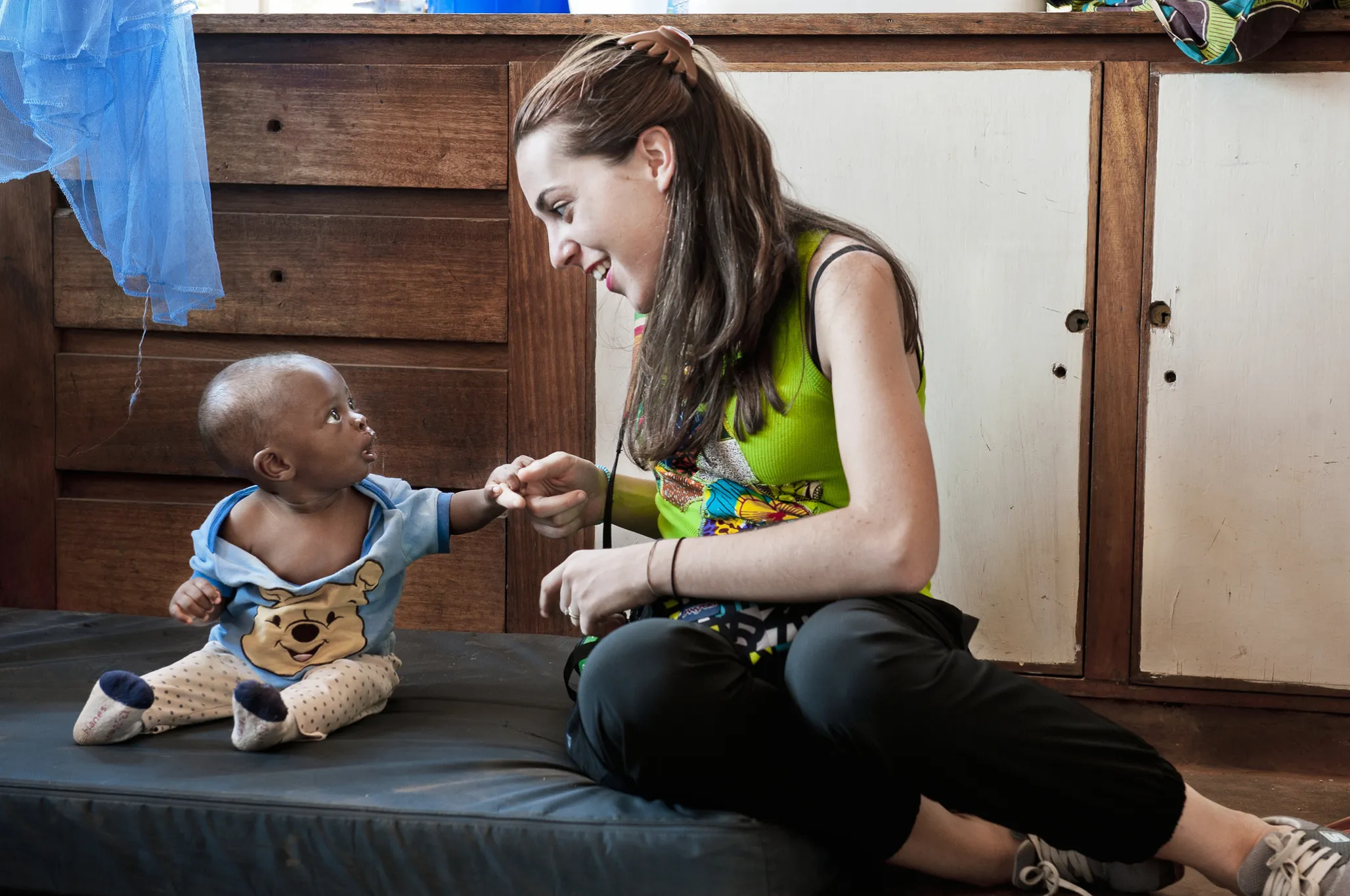 Sabrina Ghiddi, Operation Smile's regional manager of western and southern Africa, plays with a young patient during a 2015 surgical program to Lilongwe, Malawi.