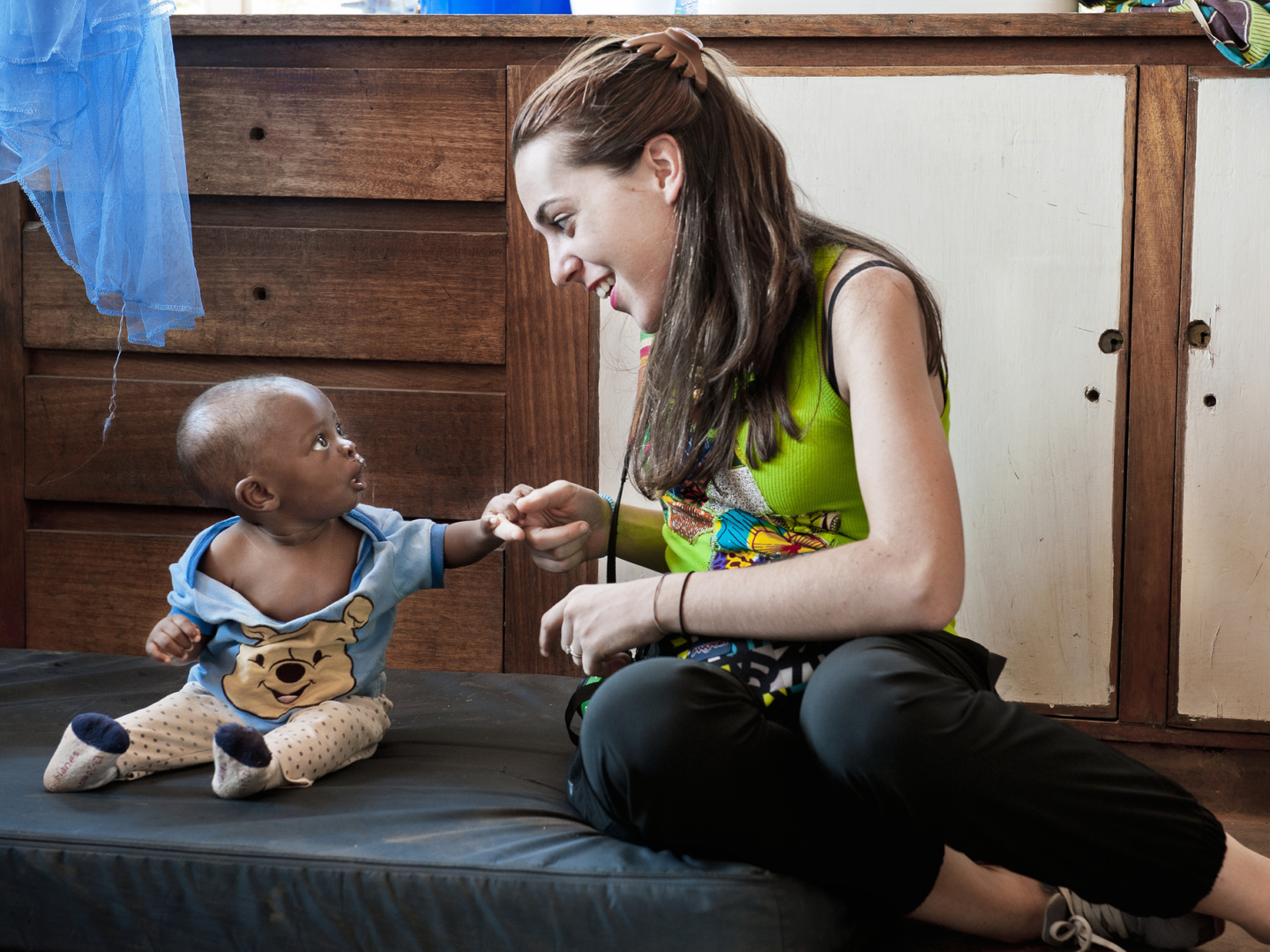 Sabrina Ghiddi, Operation Smile's regional manager of western and southern Africa, plays with a young patient during a 2015 surgical program to Lilongwe, Malawi.
