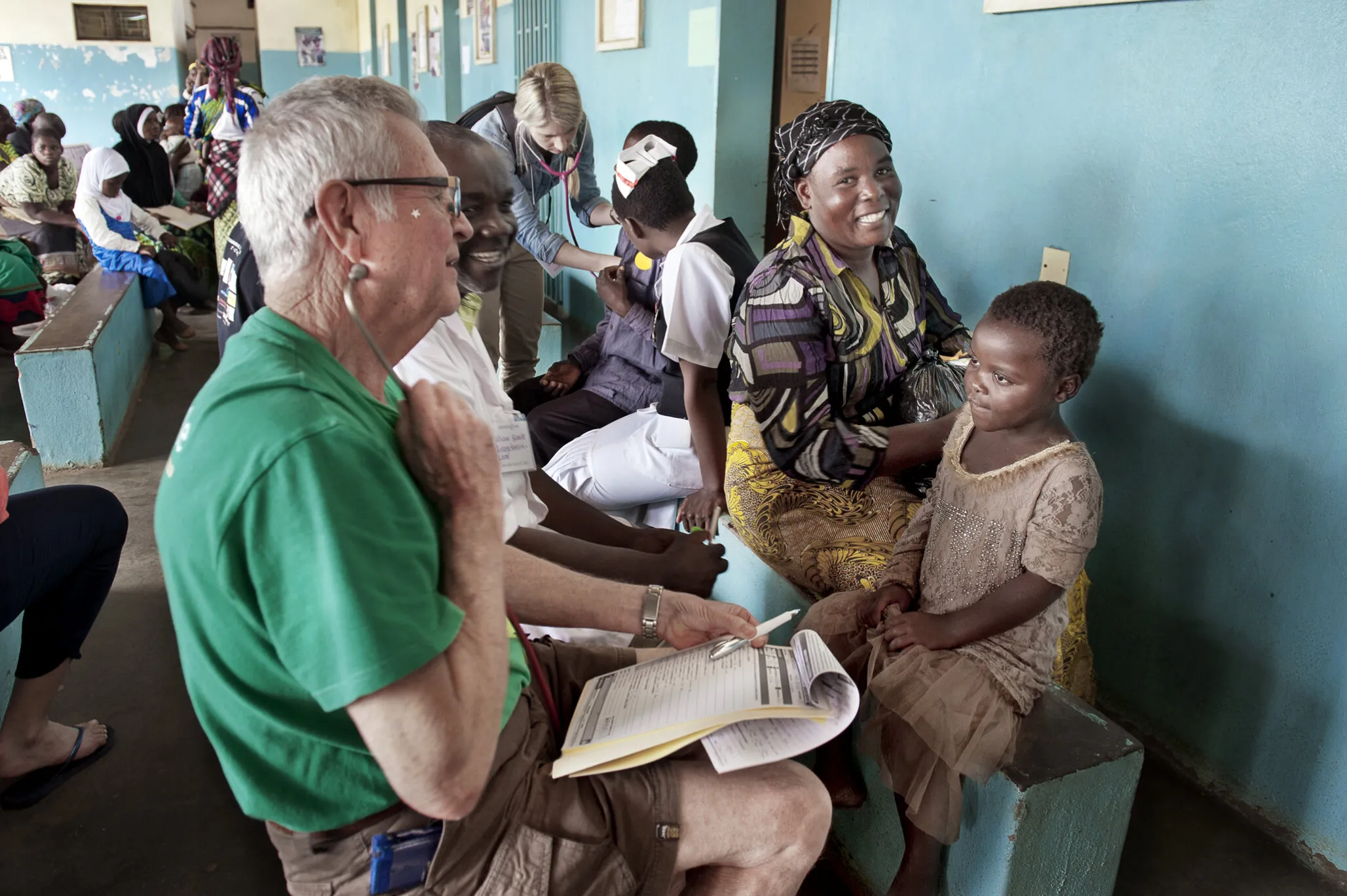 Ziyalesi, before surgery, is screened by a doctor during a program in Lilongwe, Malawi.