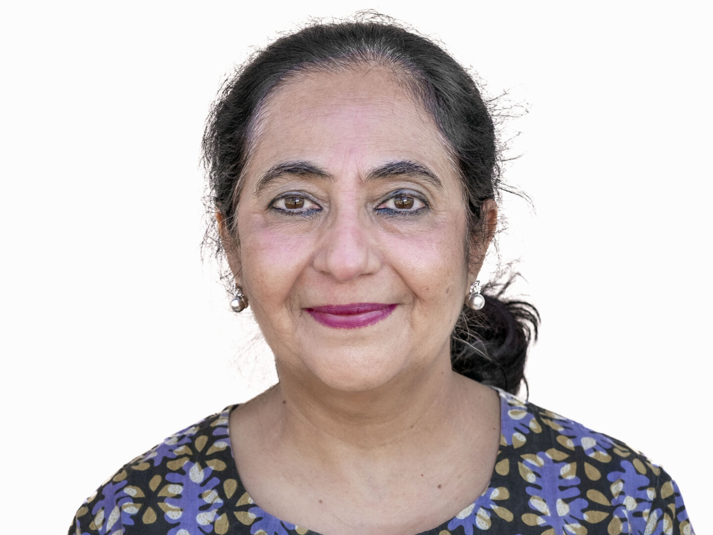 Psychosocial care provider Priti Desai smiles for the camera.