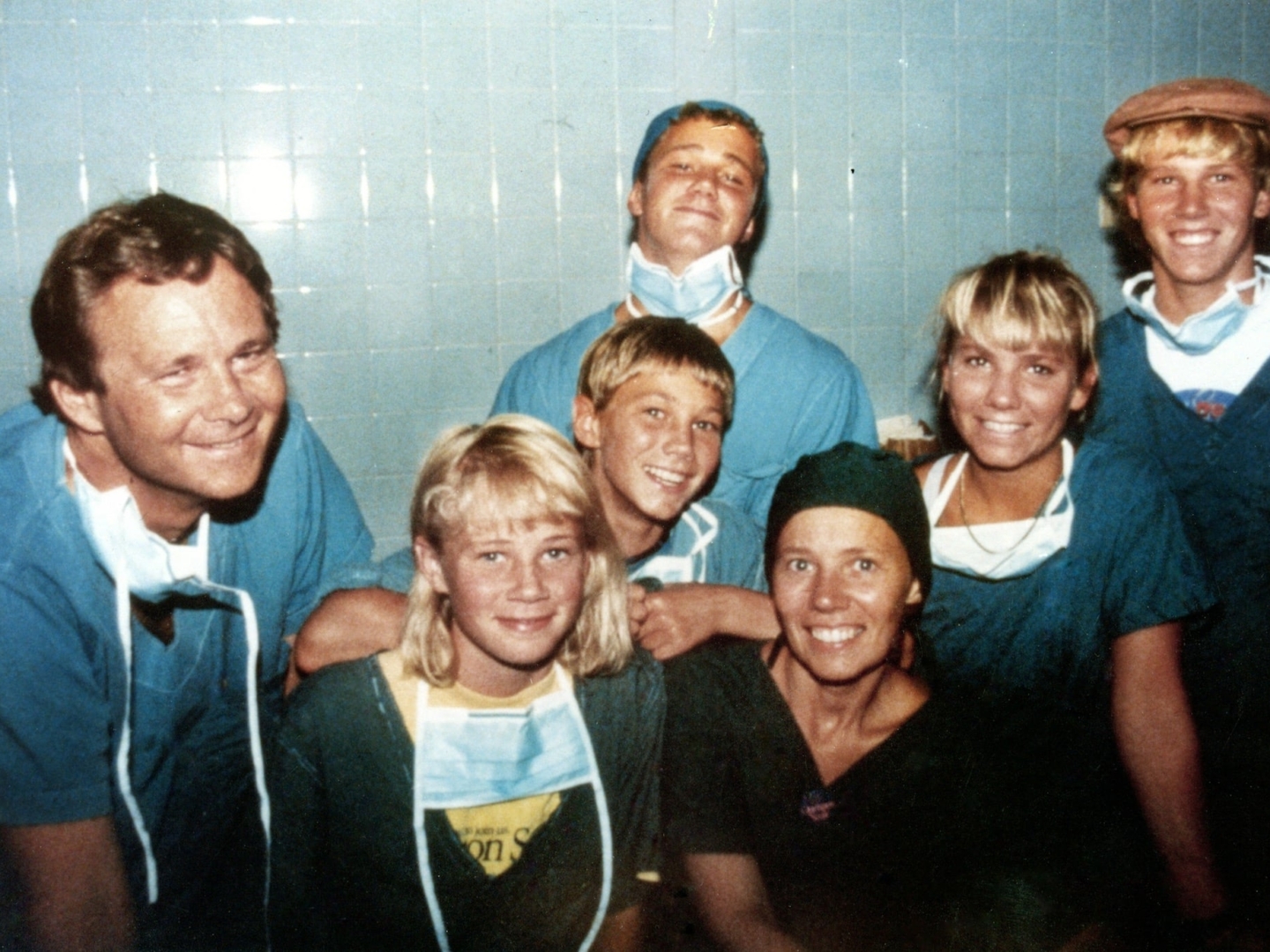 The Magee family smiles for the camera at a surgical program during the early years of Operation Smile.