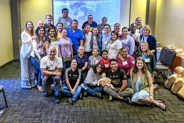 Panama MegaAHA participants and Operation Smile staff pause for a photo with Maria Berberian, Operation Smile Panama’s executive director (left), and Arlene Arias, Operation Smile’s regional director for Latin American and the Caribbean (right).