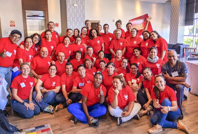 AHA instructors, trainees and Operation Smile staff pose for one last photo on the final day of Panama MegaAHA.