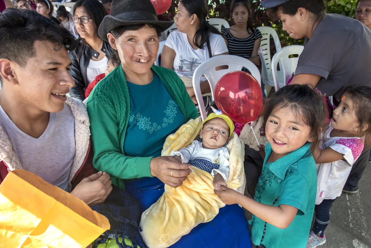 Andrea holds her 2-month-old son, Kyungmin, during Operation Smile Peru's 2019 surgical program in Lima, Peru.