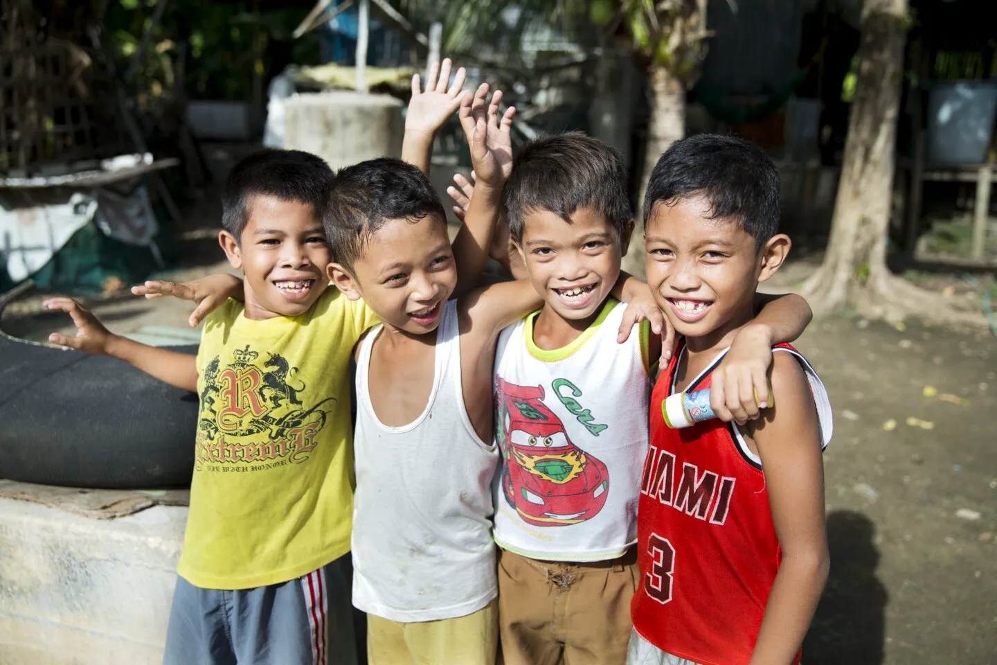 After his surgery, Efren smiles for the camera with friends.