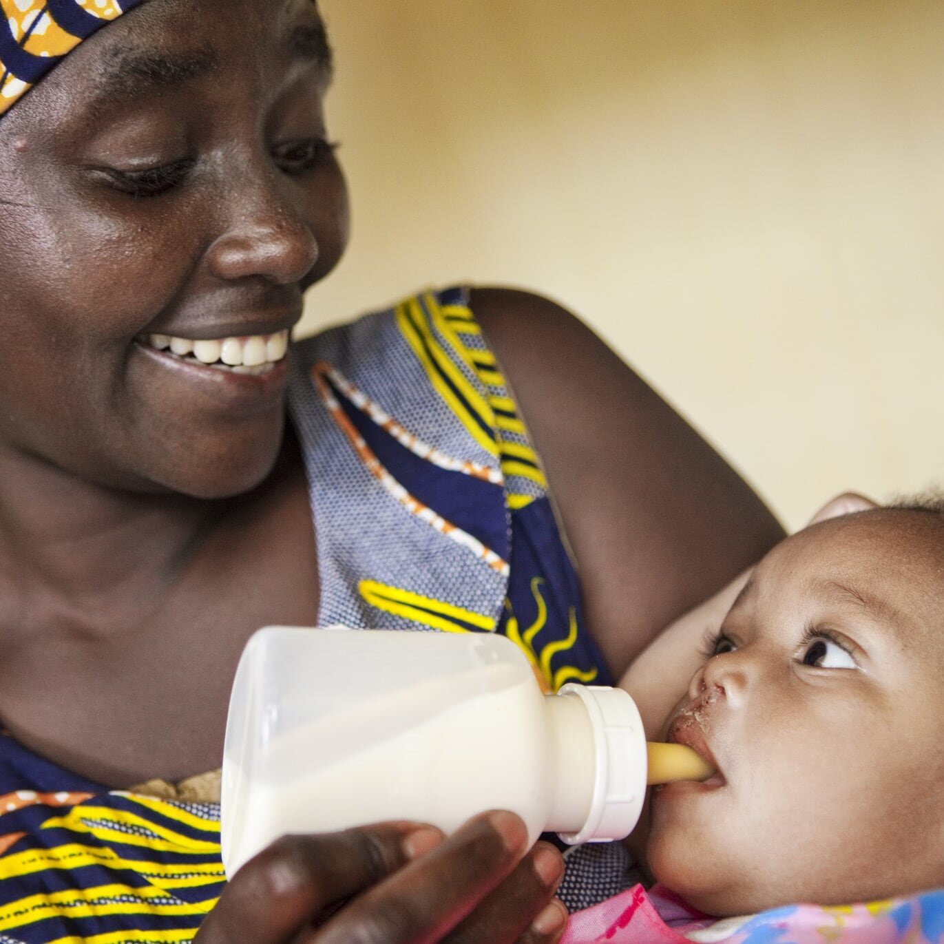 A patient enjoys a bottle during a program in Kigali, Rwanda.