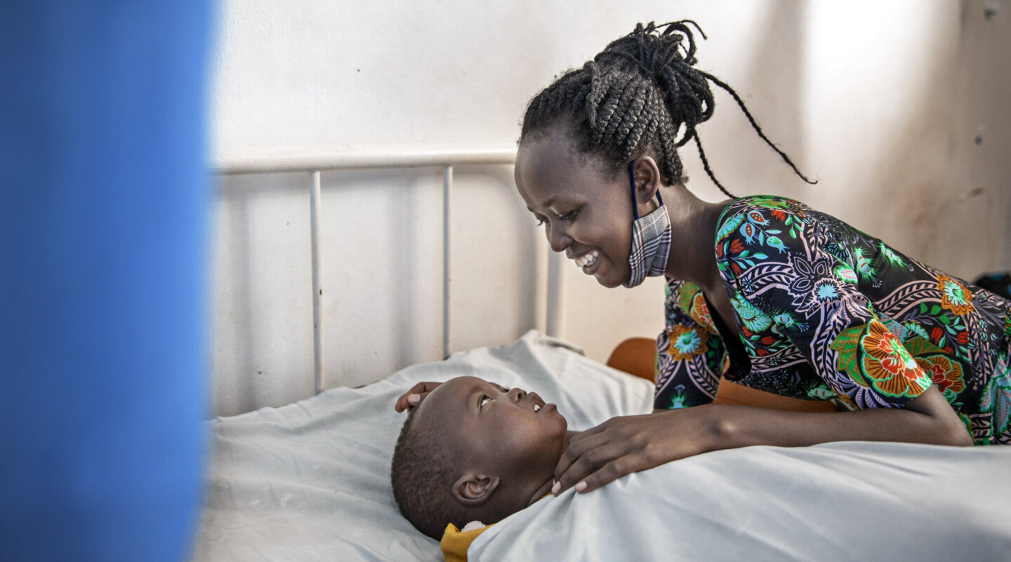 Joshua, after surgery, with his mom.