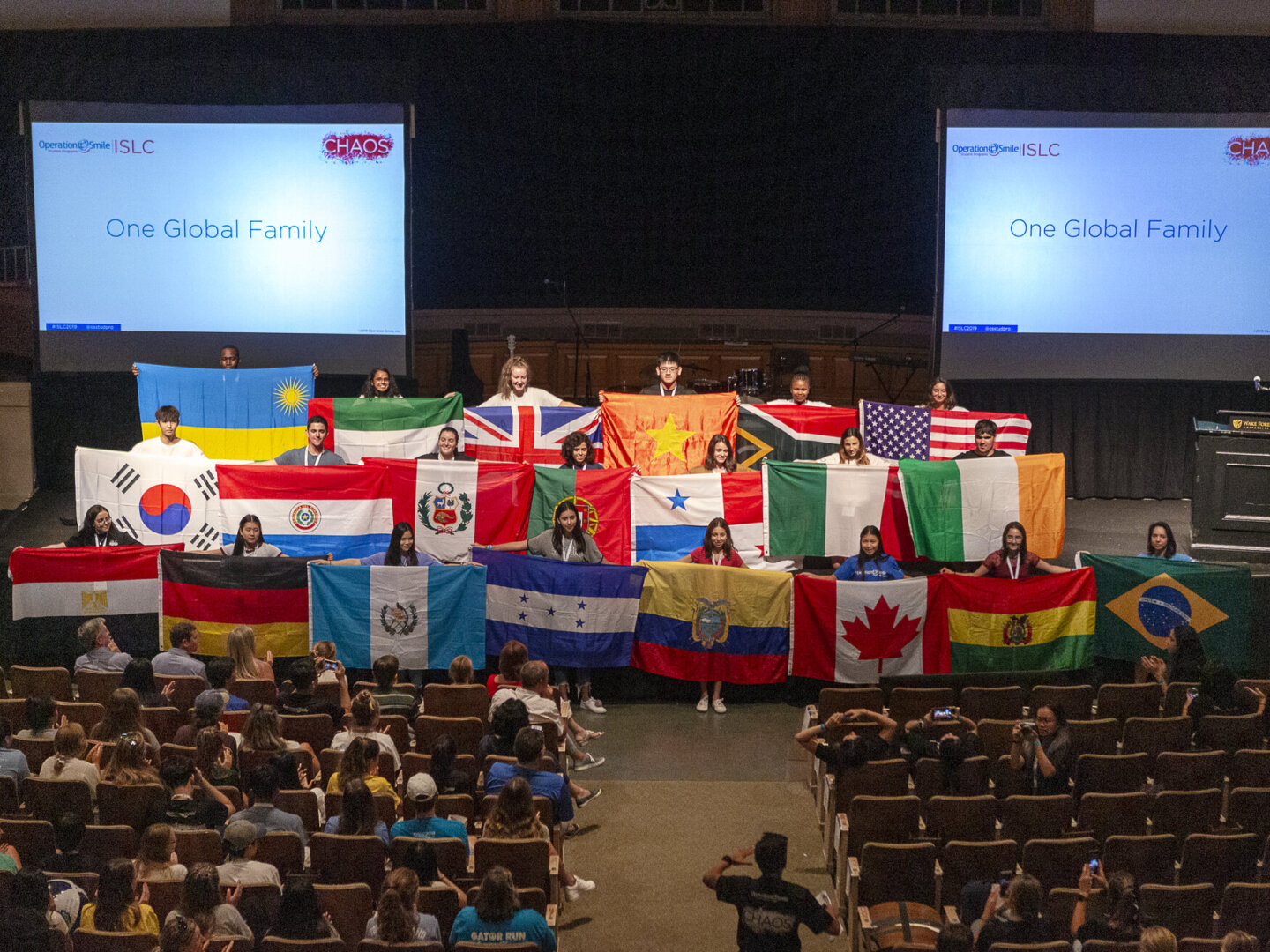 Students share flags from their countries during the 2019 International Student Leadership Conference.