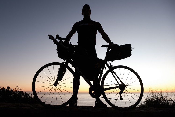 Dan Meyer stands with his bike.