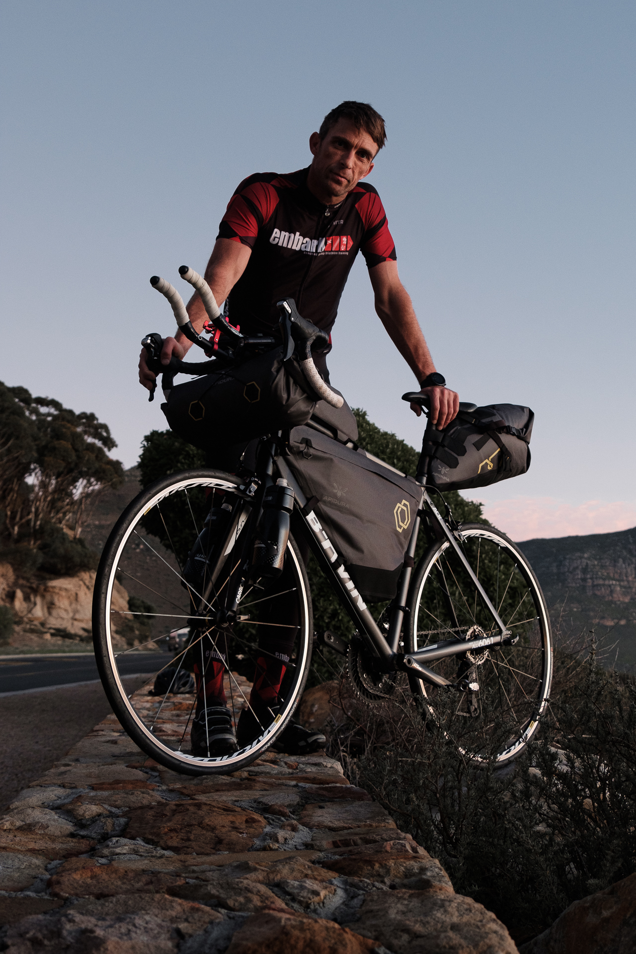Dan Meyer stands with his bike.