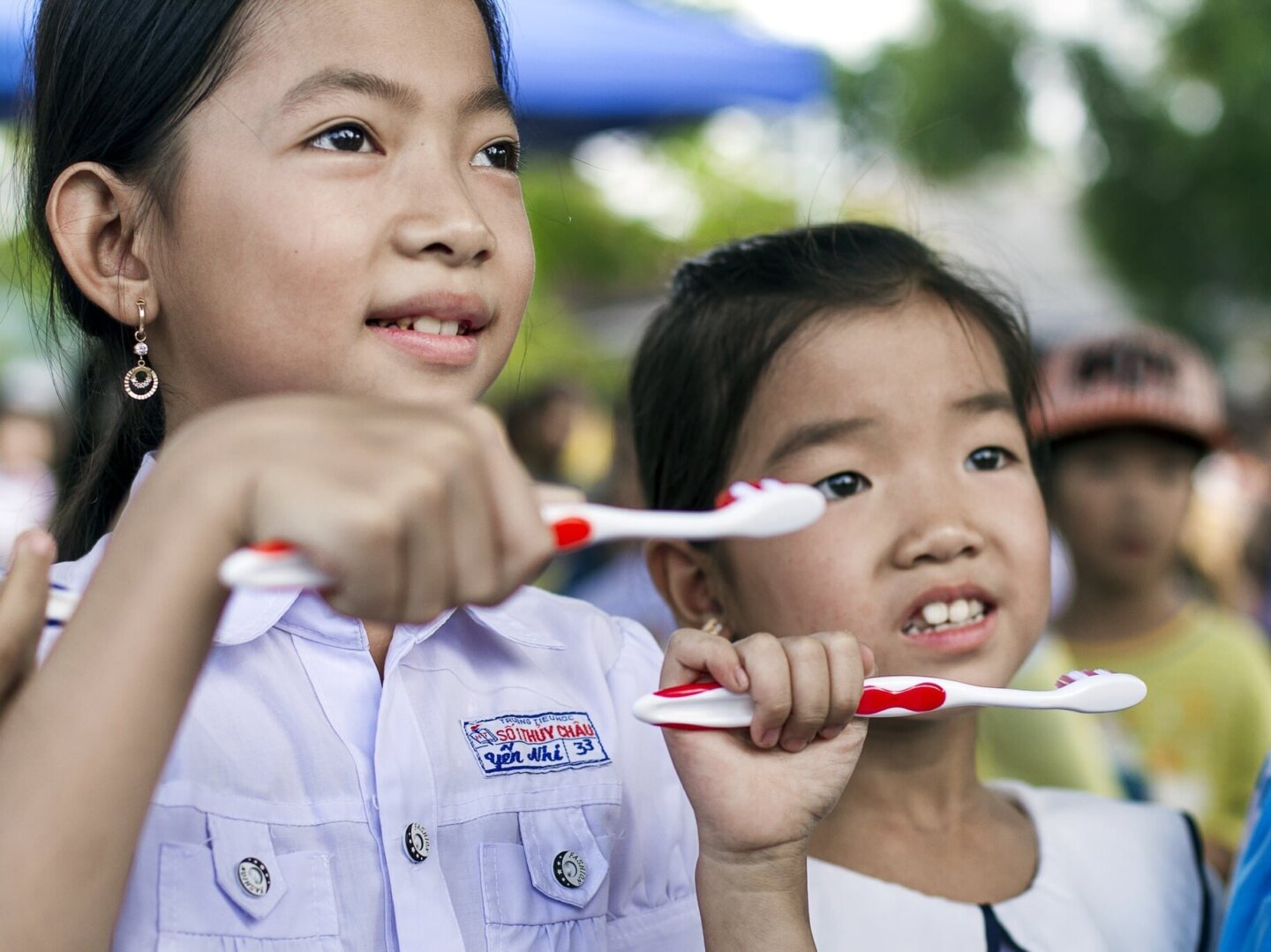 Students learn about dental hygiene during a program in Hue, Vietnam.