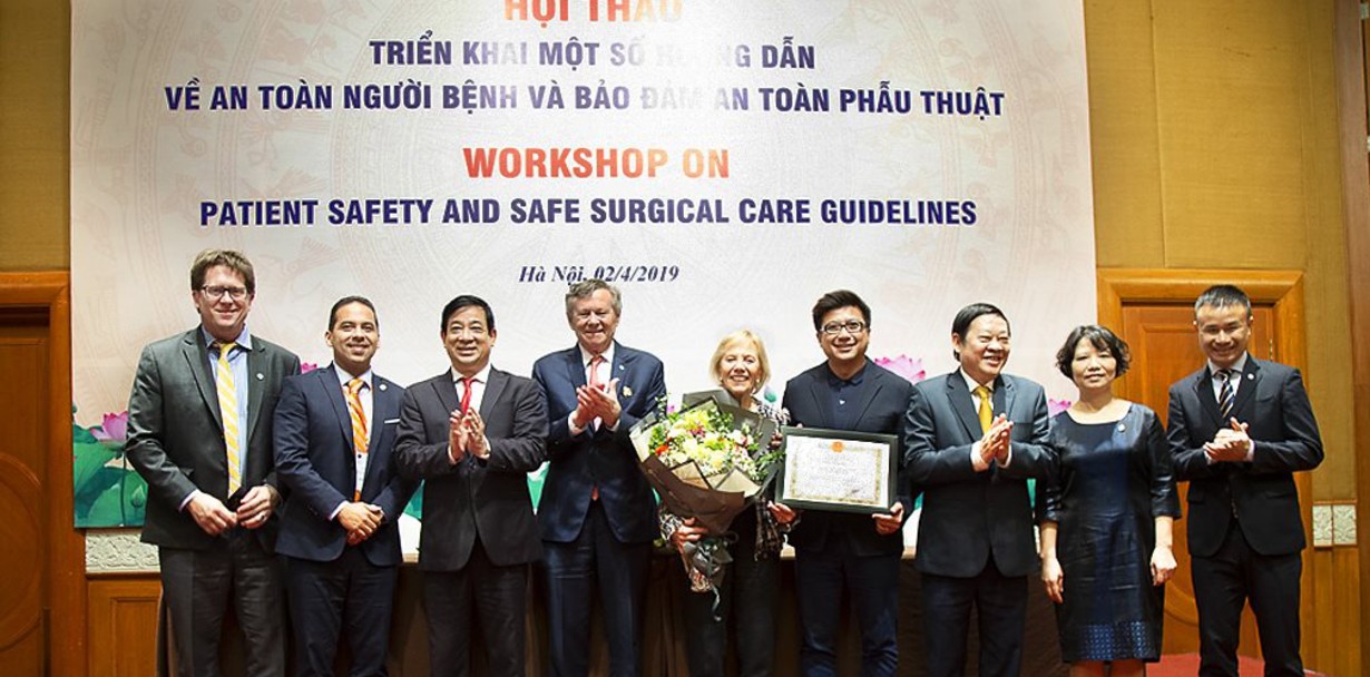 Operation Smile Co-Founders Bill and Kathy Magee smile with members of the Vietnam Ministry of Health.