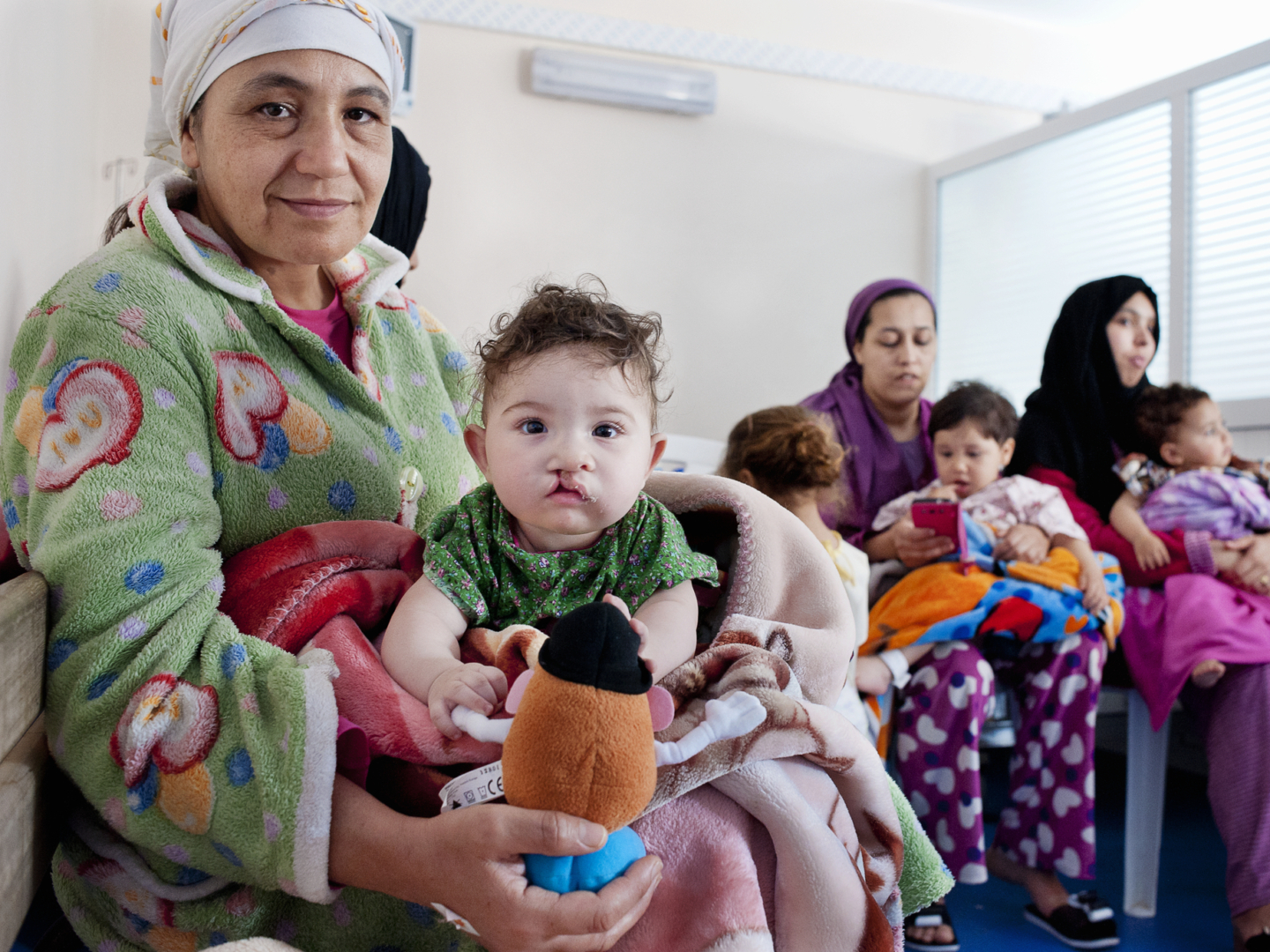 Patients wait in line during screening day in Marrakech.
