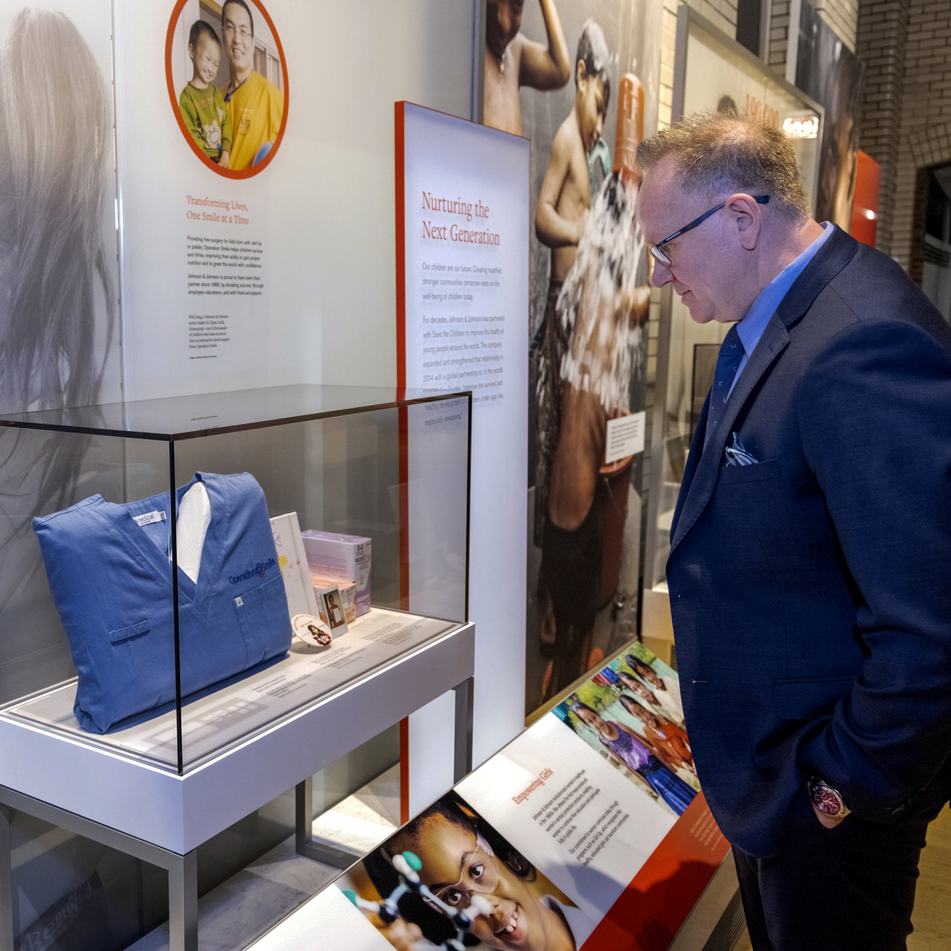 A J&J employee reads about the history